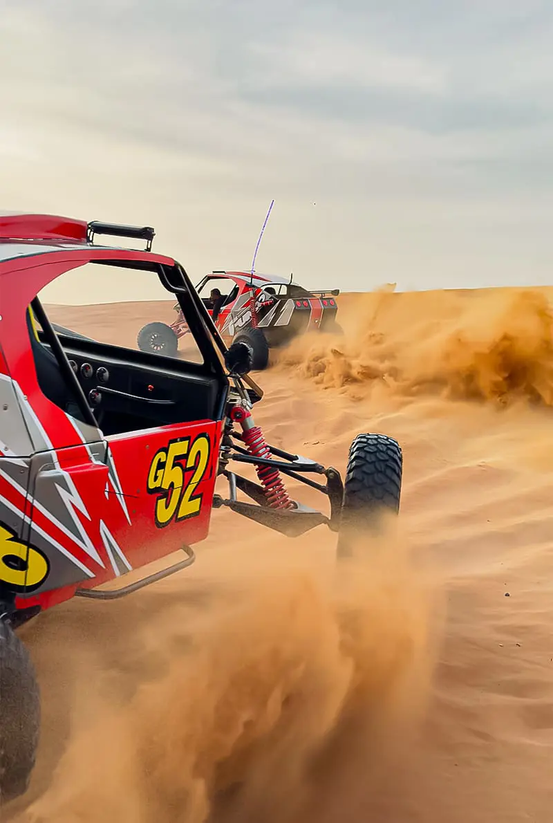 Buggy ride off the dunes in Dubai