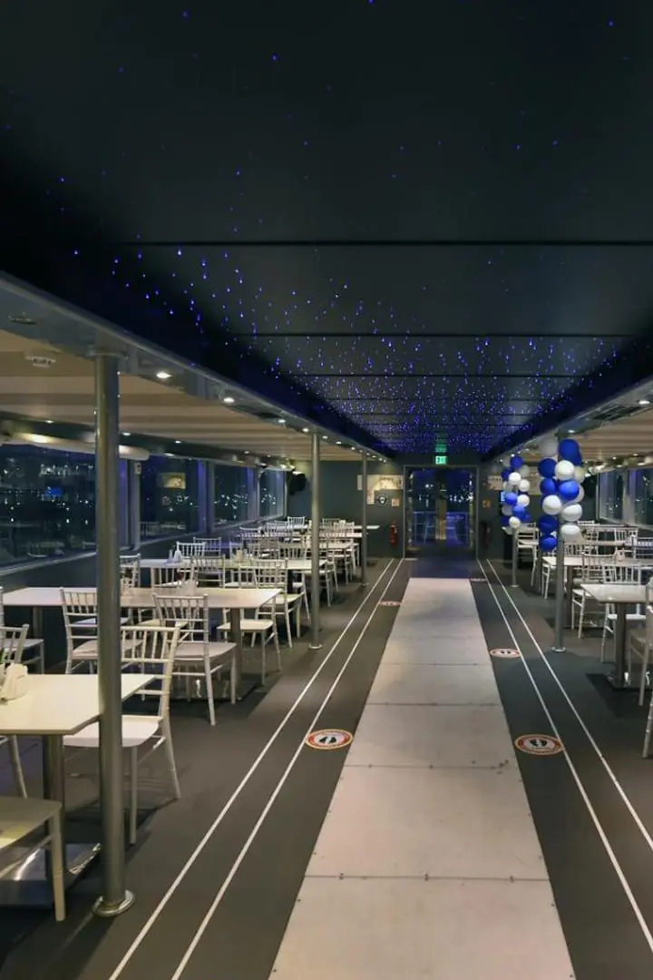 Neat Dining Area inside Unique Catamaran