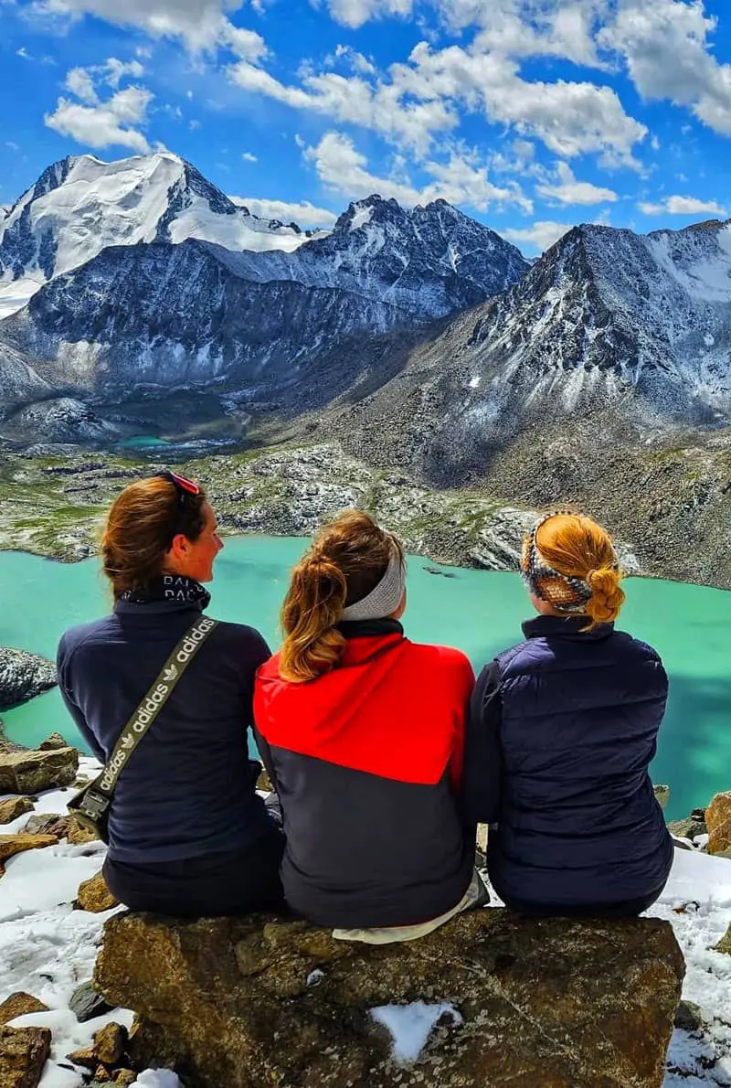 Friends enjoying the View of the mountain in Kyrgystan